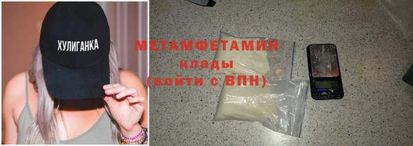 твердый Мегион